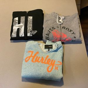2 Roxy and 1 Hurley hoodies